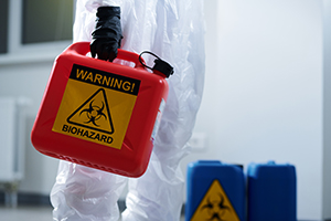 Carrying container with biohazard